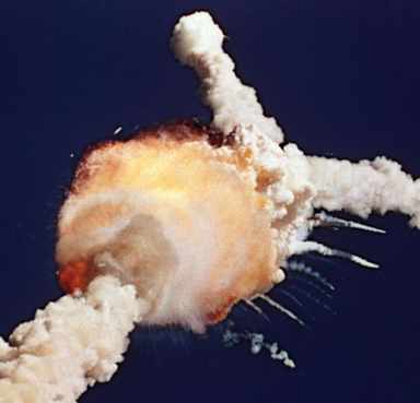 The space shuttle Challenger exploded 73 seconds after lift off. (Credit: Bruce Weaver/AP Photo)