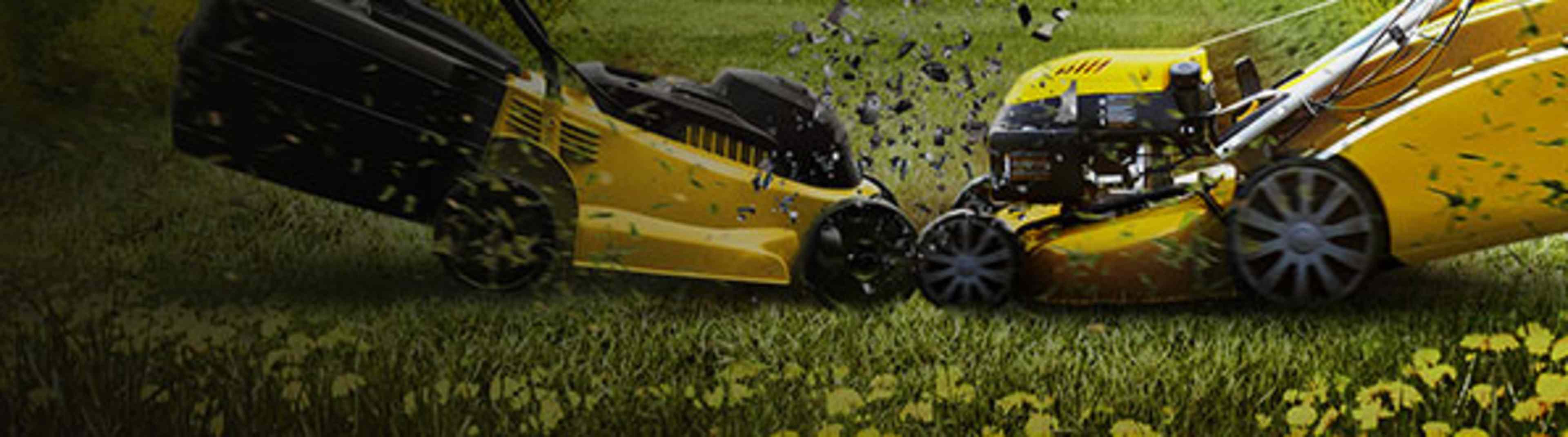 A yellow lawn mower is cutting grass on a lush, green lawn, with blades of grass being scattered in the air.