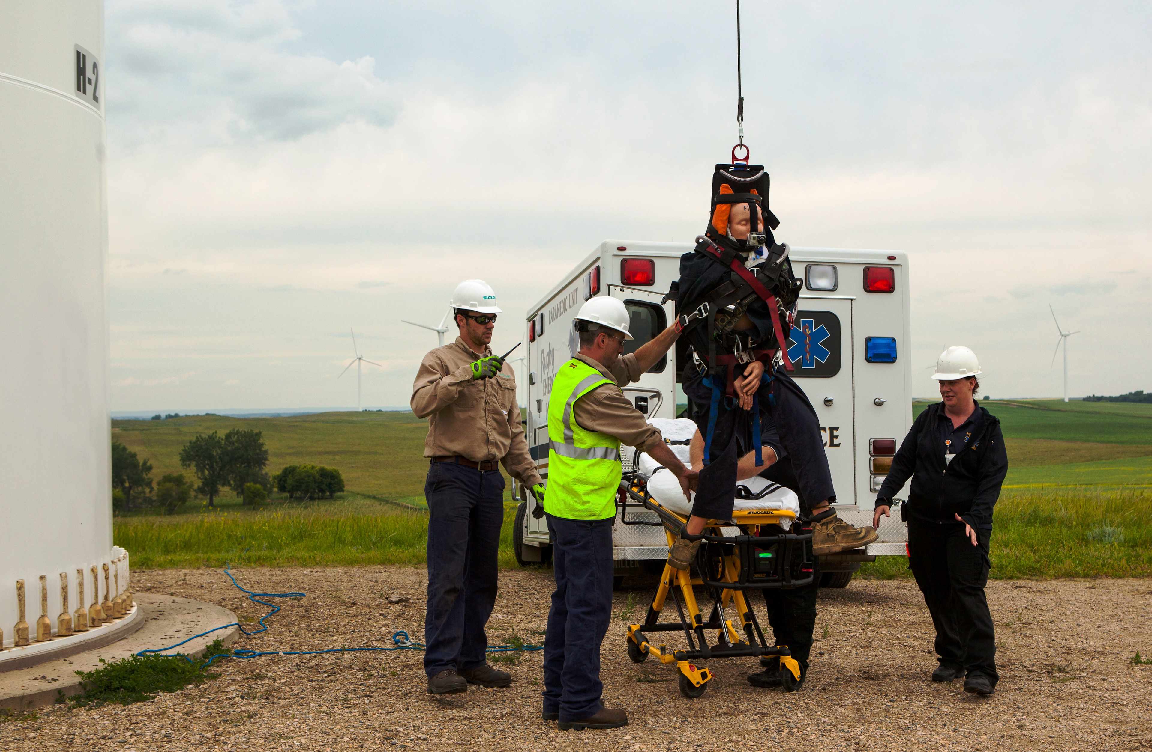 Wind tower farm employees are trained by EMS and provided with a specialized immobilization harness for lowering injured workers.