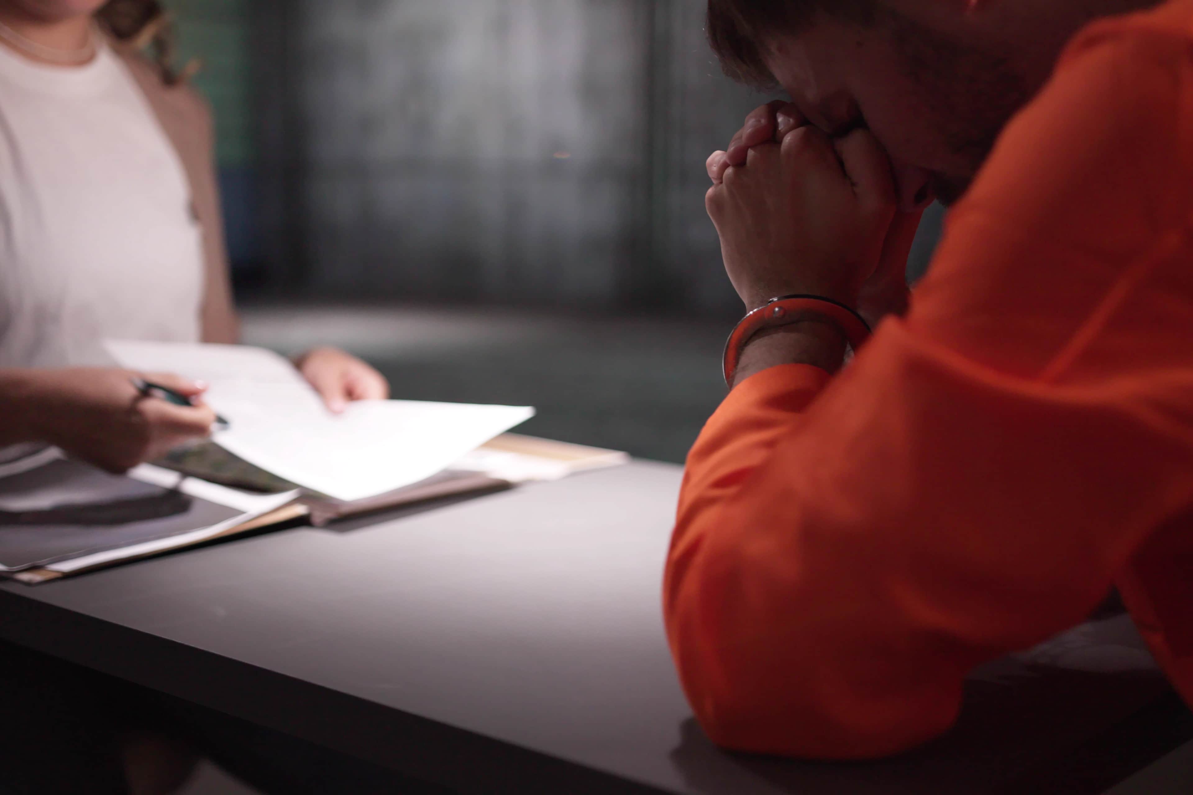 Criminal Defense Attorney In Prison. Police Investigator