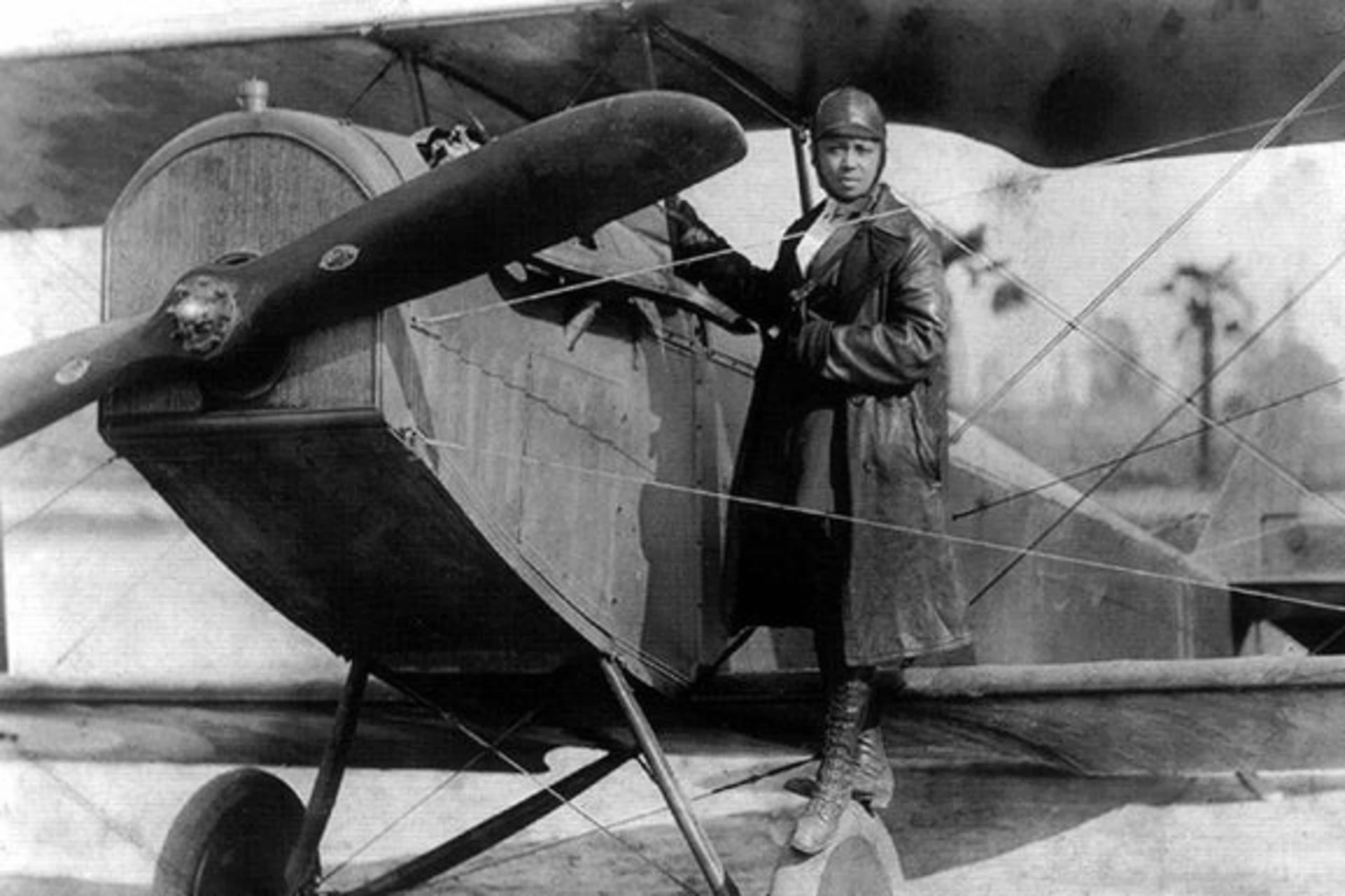 Bessie Coleman and her plane in 1922.