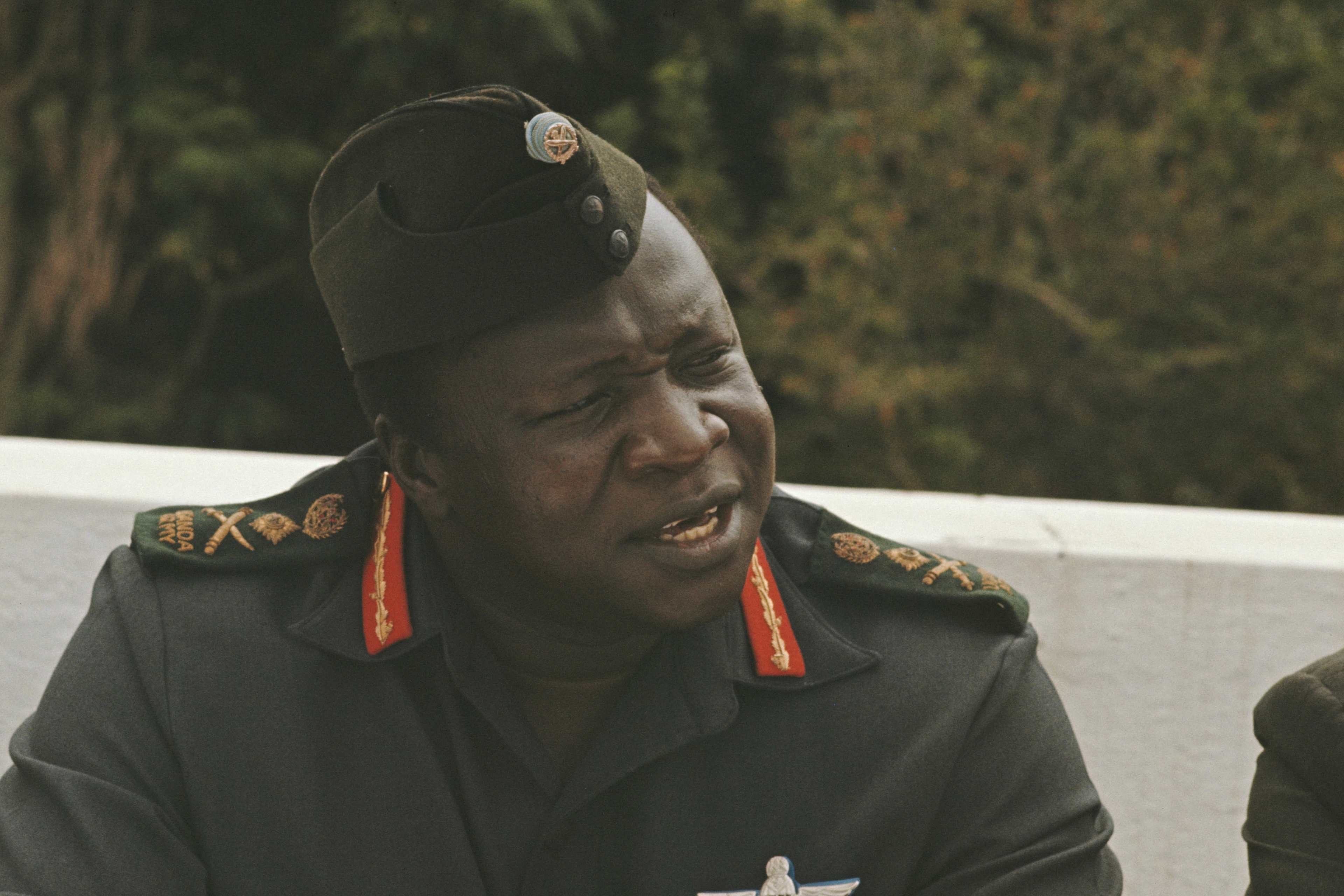 President of Uganda, Idi Amin pictured attending a lunch with British High Commissioner Richard Slater, the Indian High Commissioner, Pakistan's Ambassador and leaders of Uganda's Asian community at his house, known as 'The Command Post' in Kampala, Uganda in August 1972.
