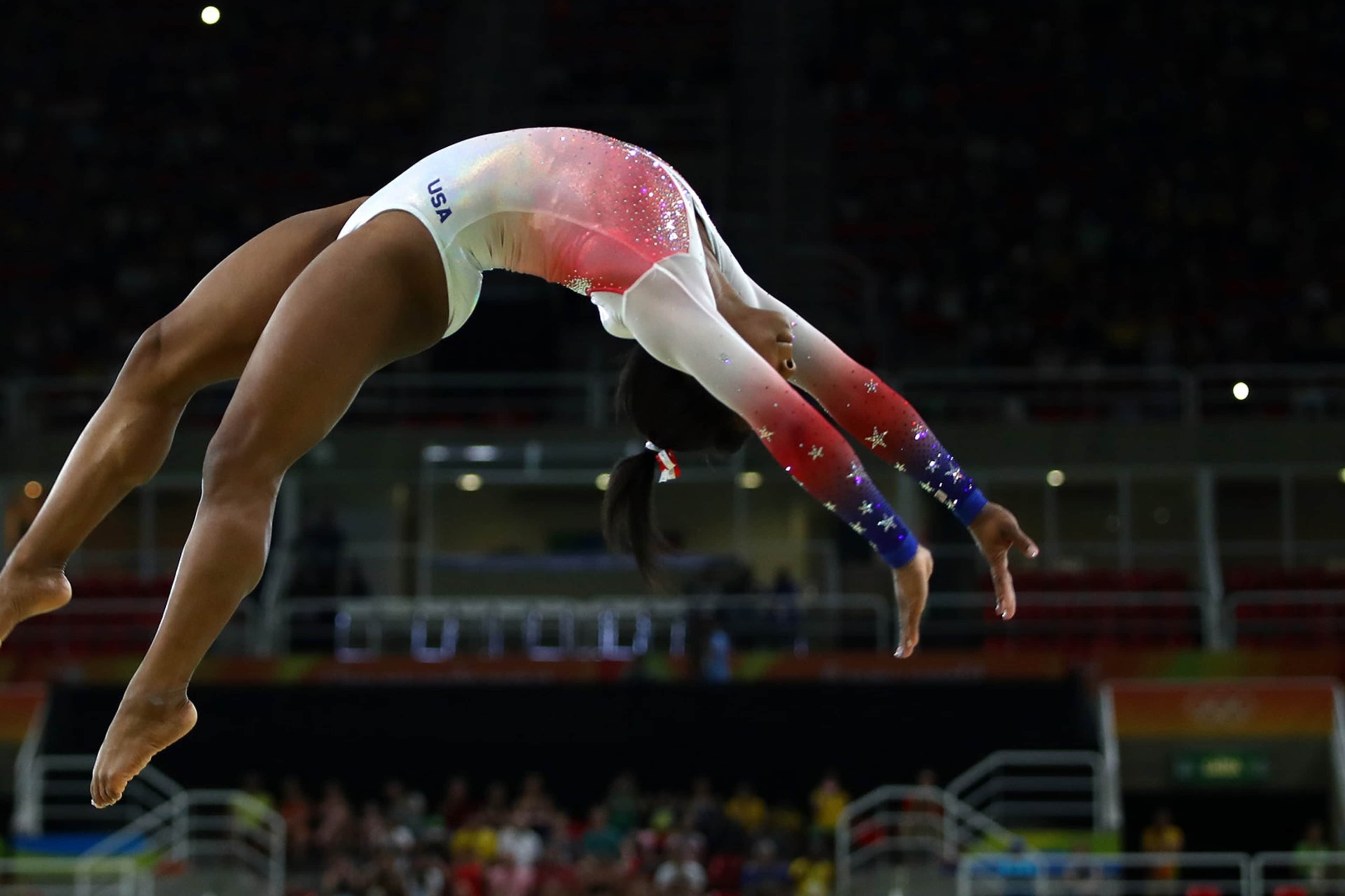 RIO DE JANEIRO, BRAZIL - AUGUST 17: Simone Biles of the United States performs on the beam during the Gymnastics Rio Gala on Day 12 of the 2016 Rio Olympic Games on August 17, 2016 in Rio de Janeiro, Brazil.
