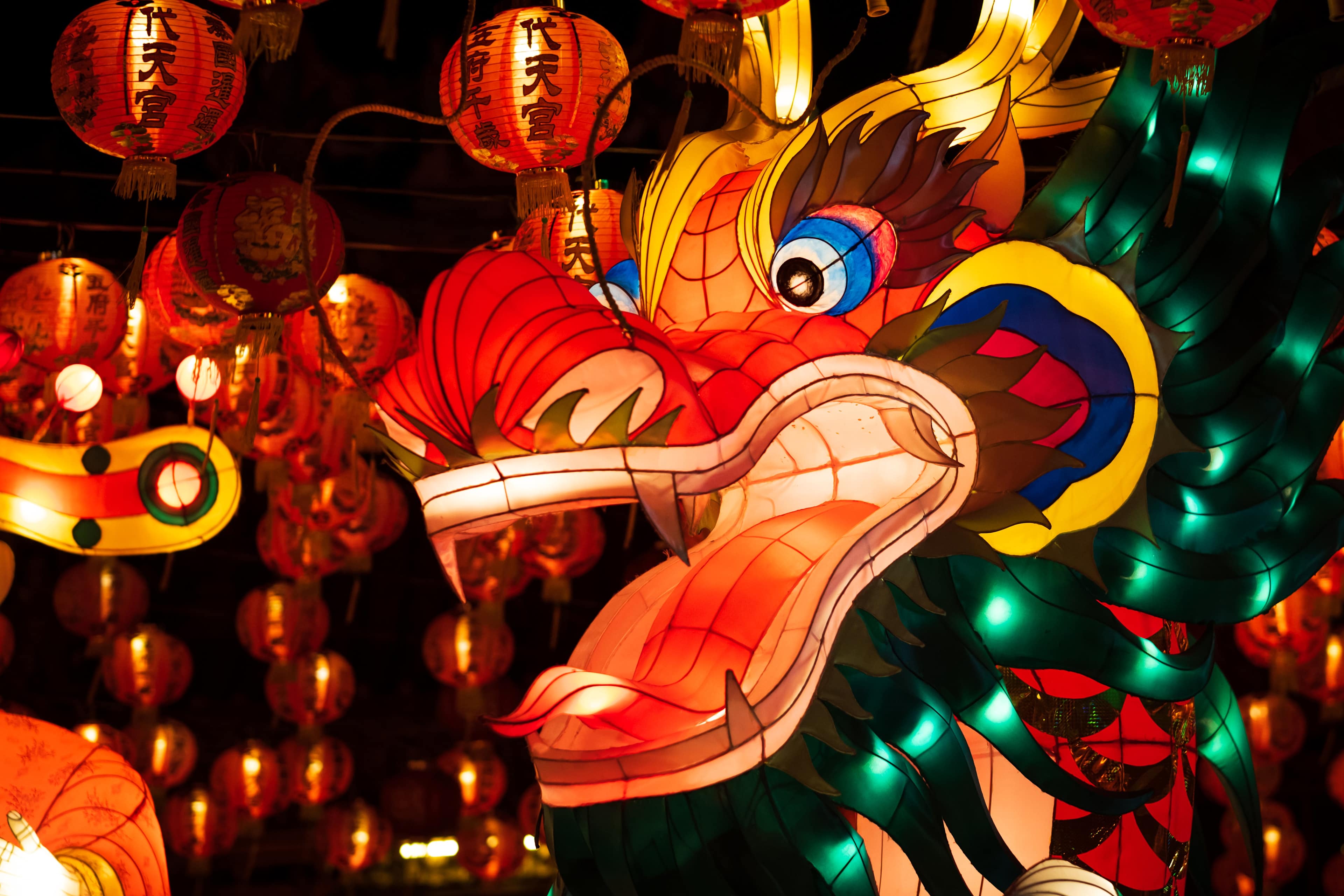 Chinese traditional dragon lantern illuminated at night during Chinese / Lunar New Year.