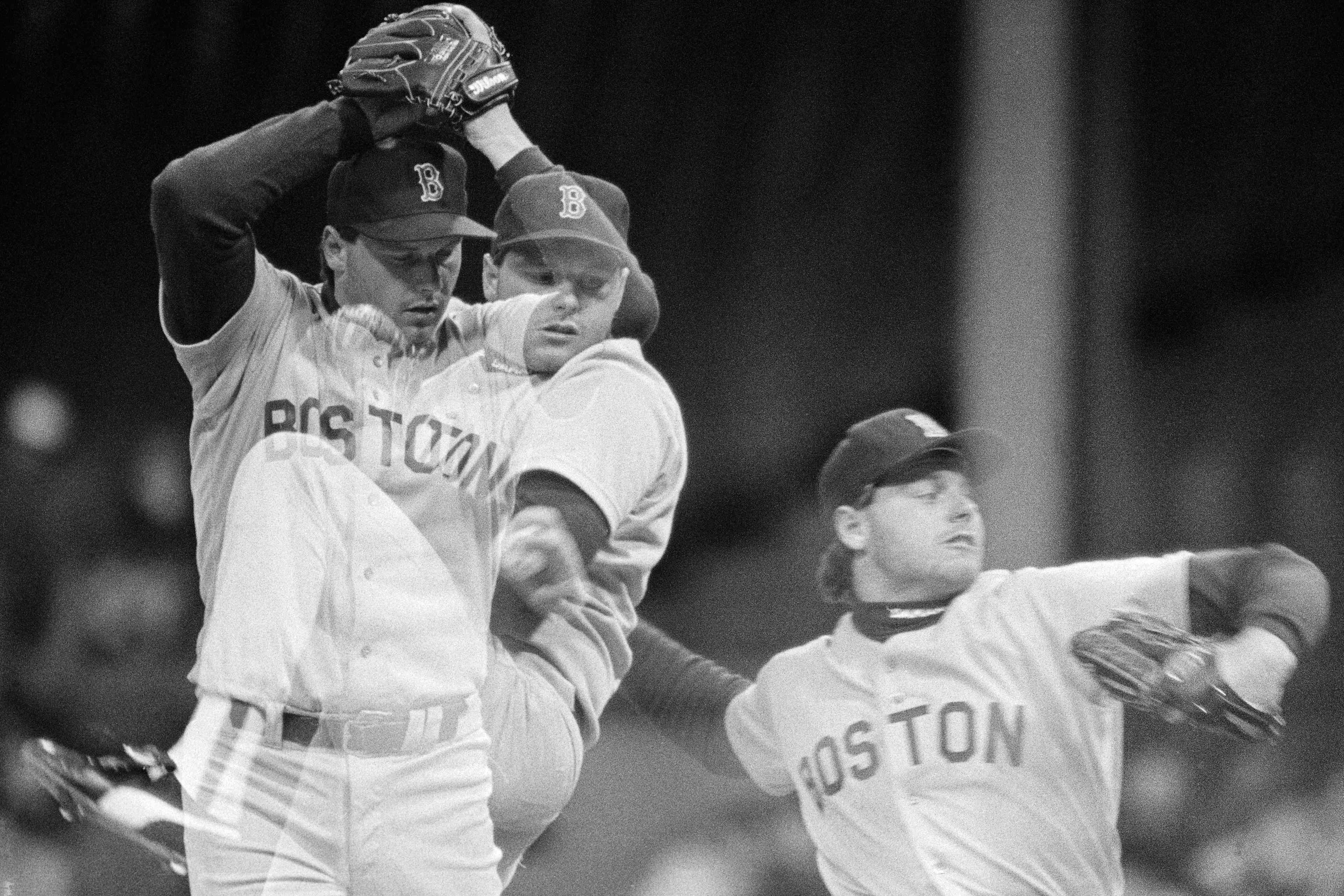 Boston Red Sox pitcher Roger Clemens is shown in his wind up and pitch during the 1st inning of the Detroit-Boston game in this multiple exposure.