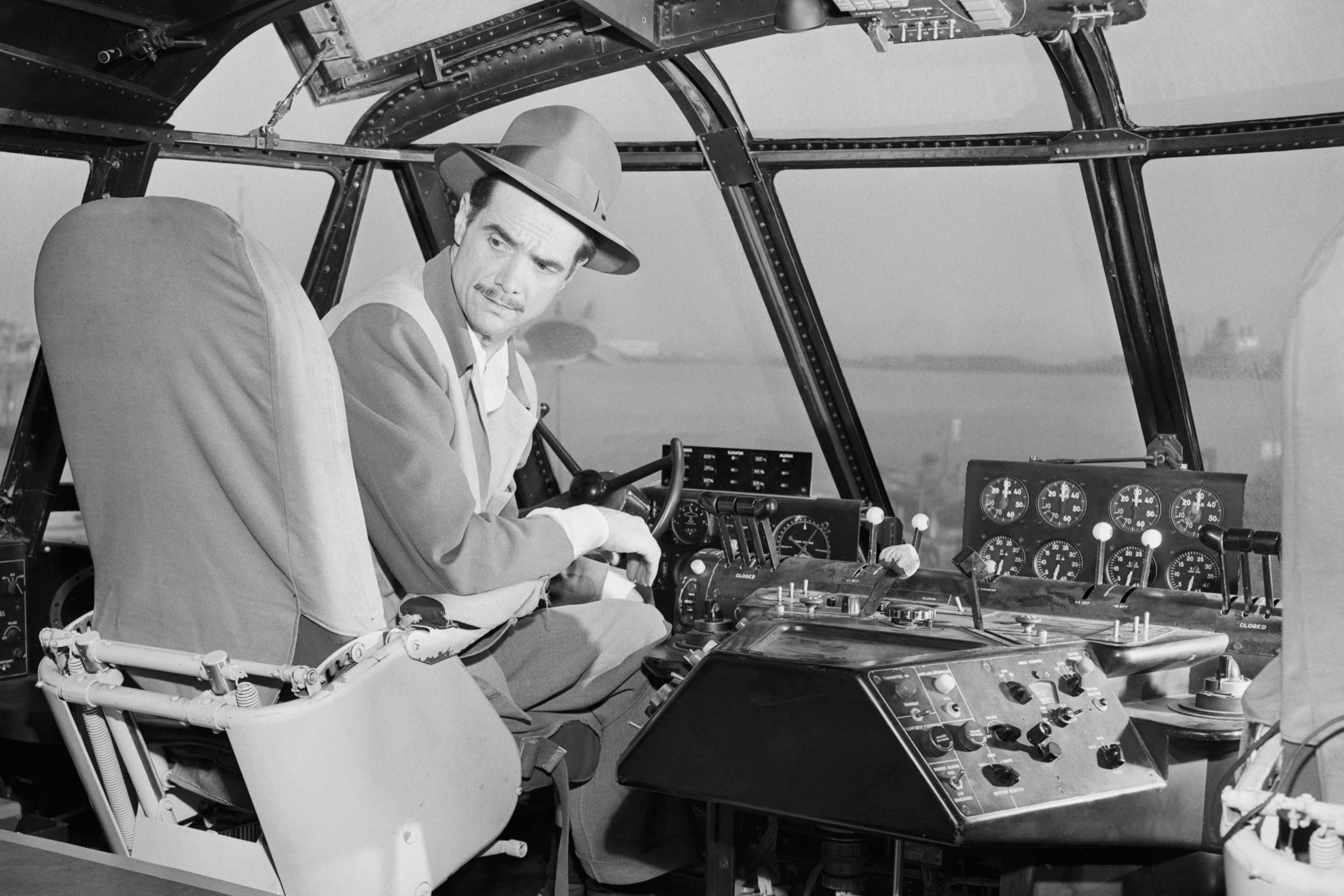American aircraft designer Howard Hughes prepares for the trial run of his strategic airlift flying boat, the Hughes H-4 Hercules (aka the 'Spruce Goose'), Los Angeles harbor, 2nd November 1947. The brief flight was the aircraft's first and only time airborne.