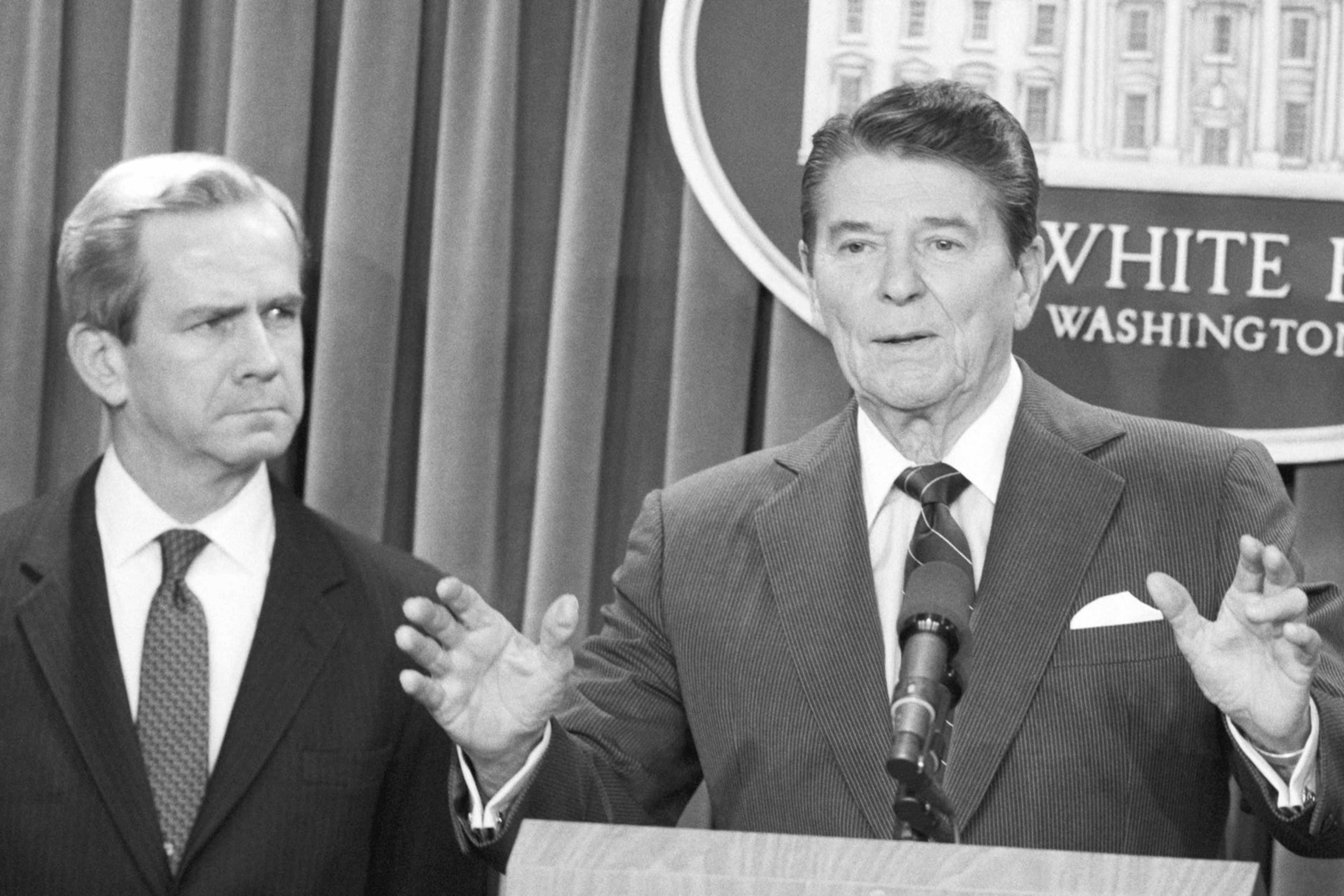 President Reagan At Press ConferenceUnited States President Ronald Reagan announces the resignation of national security adviser Robert McFarlane standing beside him to be replaced with Vice Admiral John Poindexter. McFarlane and Poindexter were key figures in the Iran-Contra affair during Reagan's term.