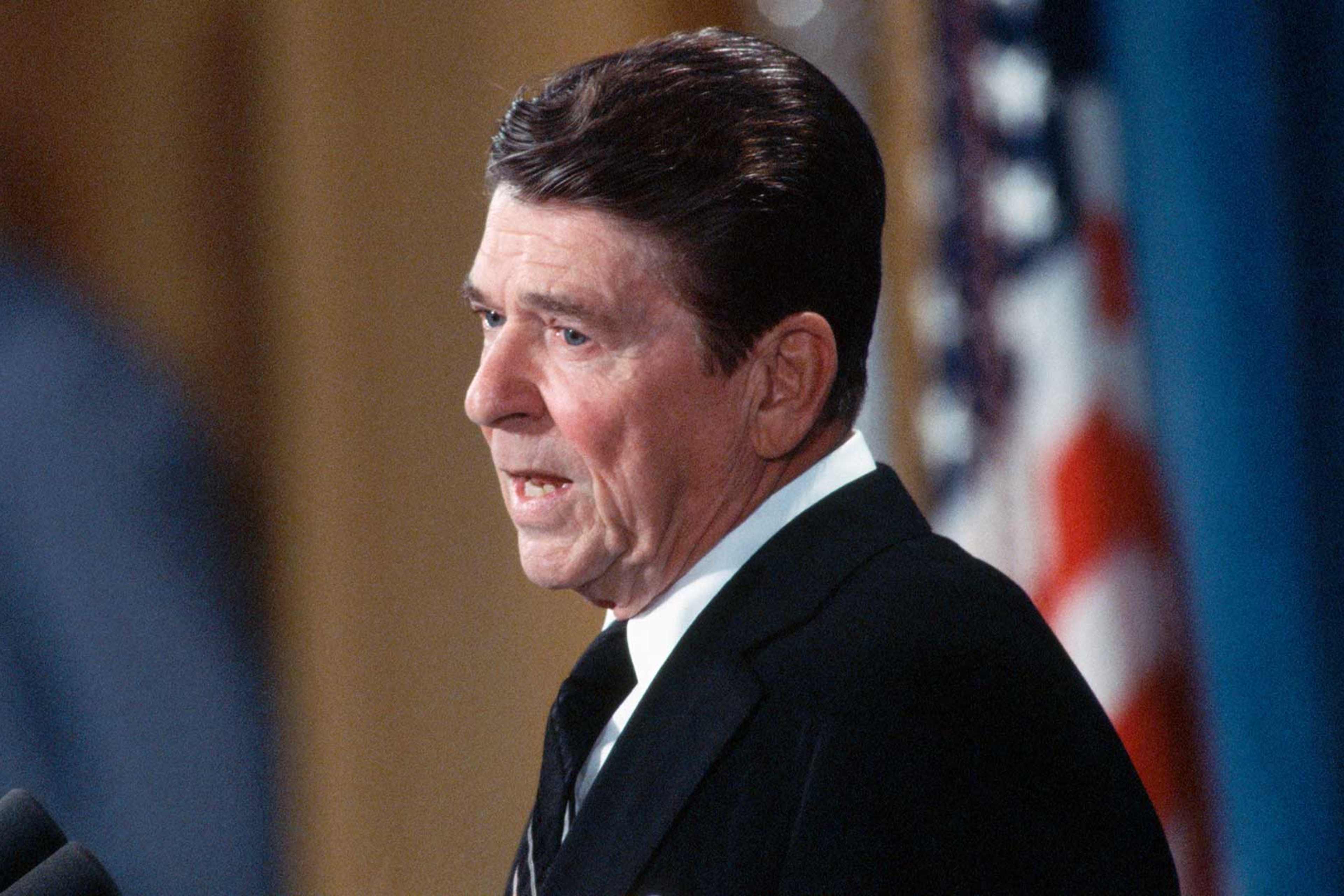 President Ronald Reagan answers a reporter's question during a White House news conference in 1980.