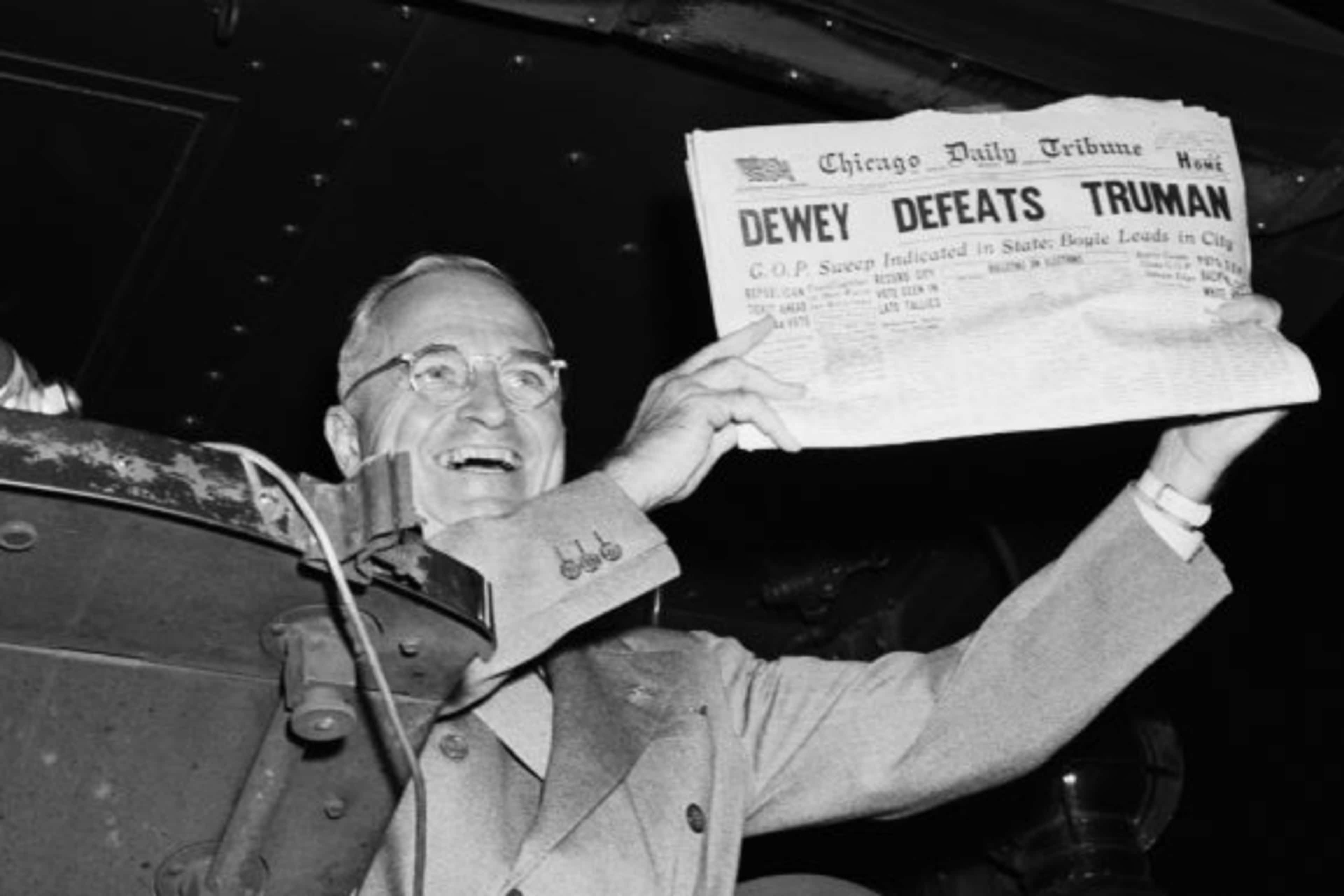 President Harry Truman holds up a copy of the Chicago Daily Tribune declaring his defeat to Thomas Dewey.