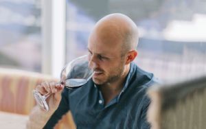 Dustin Wilson Tasting Wine