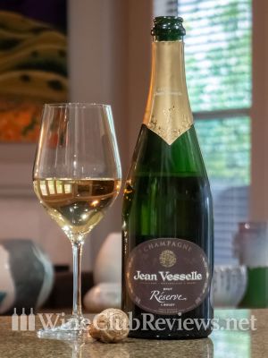 Jean Vesselle Brut Réserve NV Front of bottle with glass of wine