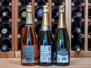 The inaugural shipment from Pour Me Wines sparkling wine club — backs of bottles