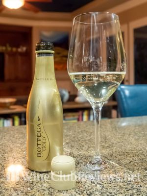 Bottega Gold, Prosecco di Valdobbiadene DOC Front of bottle with glass of wine