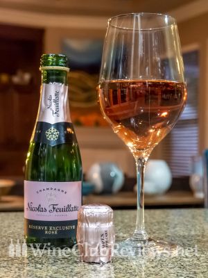 Nicolas Feuillatte Réserve Exclusive Rosé 2016 Front of bottle with glass of wine