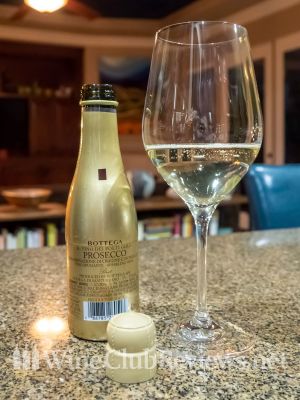 Bottega Gold, Prosecco di Valdobbiadene DOC Back of bottle with glass of wine