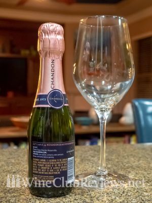 Chandon Brut Rosé Back of bottle with wine glass