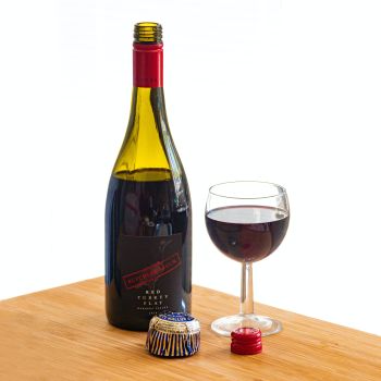 Red screw top wine with glass