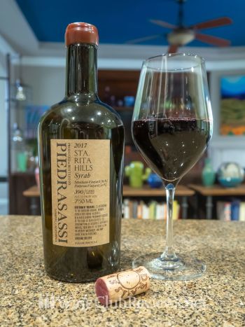 Sta. Rita Hills Syrah: front of bottle with wine in glass