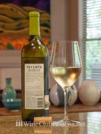 “Special Club” White Wine Blend: front of bottle with wine in glass