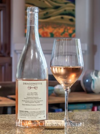 Rosé: front of bottle with wine in glass