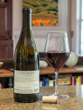 Sta. Rita Hills Pinot Noir: front of bottle with wine in glass