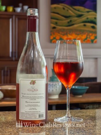 Syrah Rosé: front of bottle with wine in glass