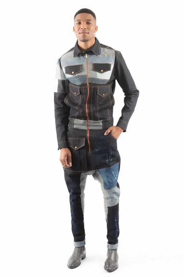 Model wearing an upcycled men’s jumpsuit designed by denim brand, Afrikan Swiss. Made in South Africa. Perfect for when you are looking for festival outfit ideas.