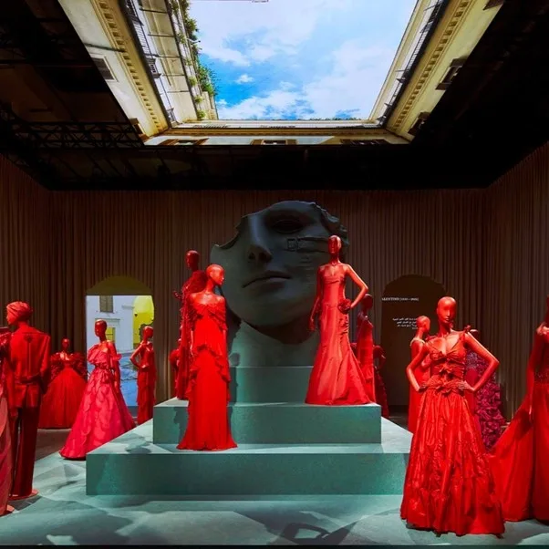 An image of Valentino red dresses in the Forever Valentino exhibition.
