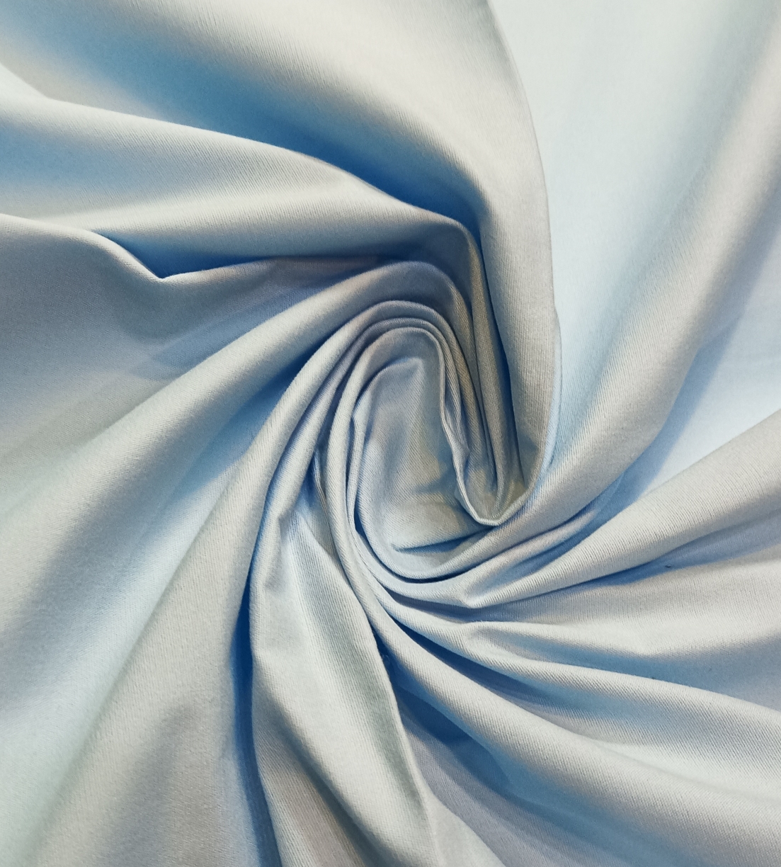 Nokia-667 100% Cotton plain poplin, Mercerized & Silicon finishes, Brushed and Carbon mechanical hand, Sky Blue, 125 GSM