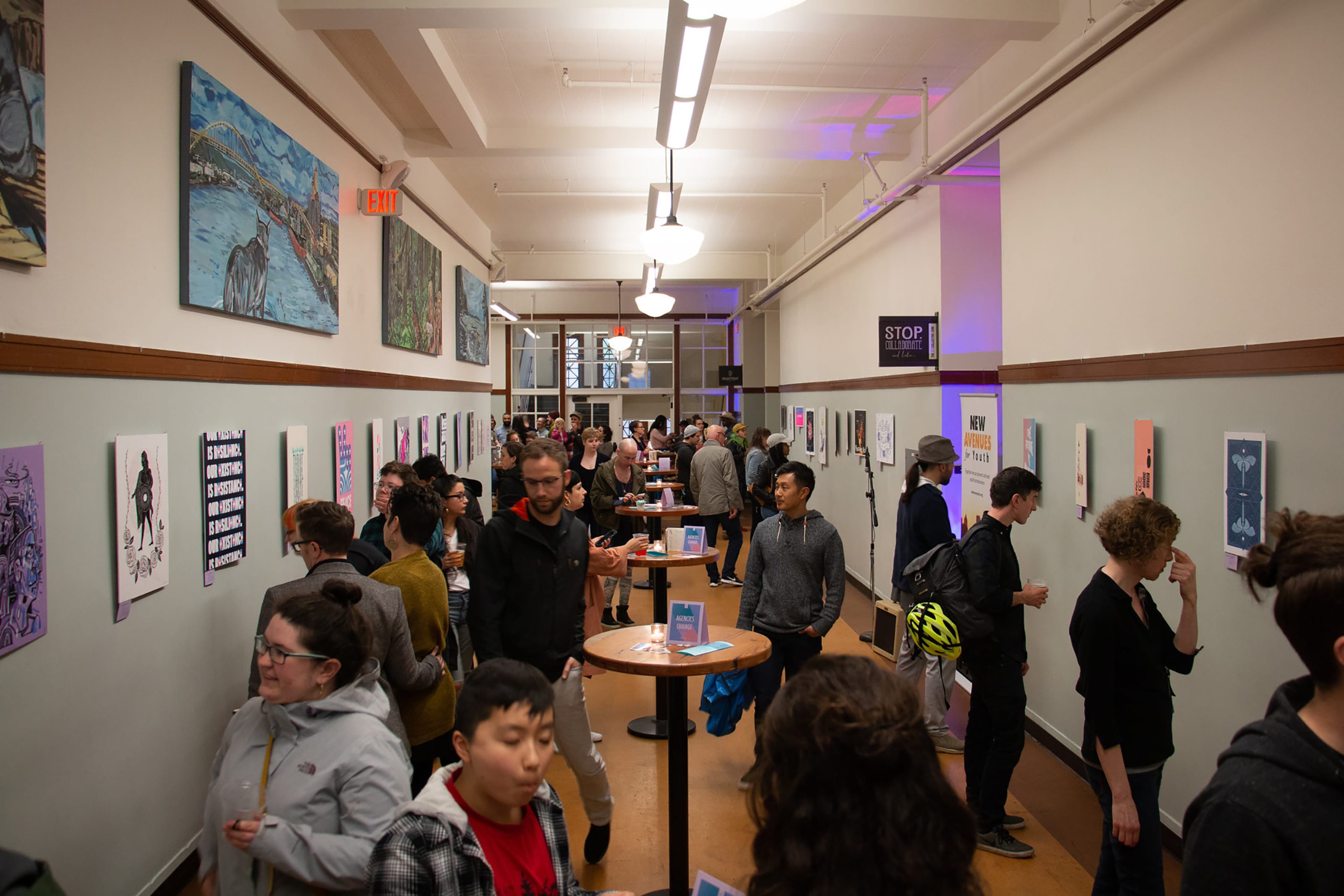 Crowd looking at posters