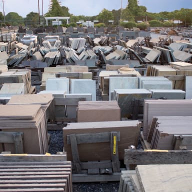 Our stone yard is fully stocked with a wide variety of materials, including natural stone, pavers, decorative gravel, crushed stone, topsoil, mulch, sand, and more.