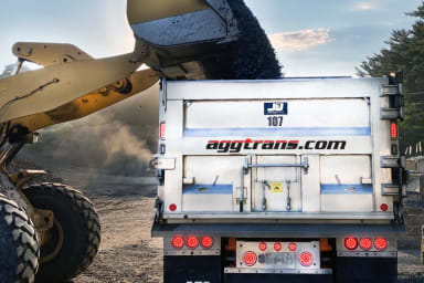 Aggtrans dump truck being loaded with materials