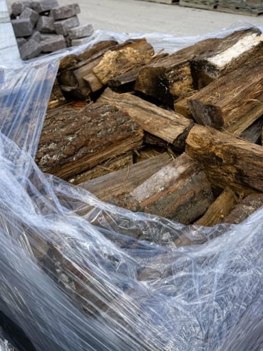 Firewood, split seasoned hardwood, shrinkwrapped and palletized