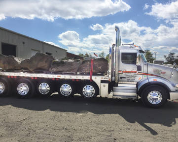 Flatbed truck with boulders