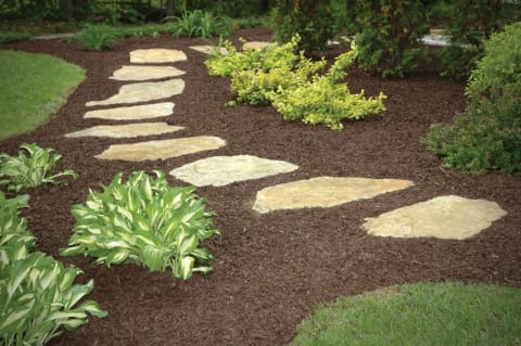 Mulched Gardens with Natural Stone Steppers Mulched Gardens with Natural Stone Steppers