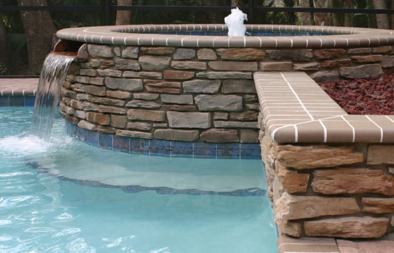 stacked stone pool waterfall