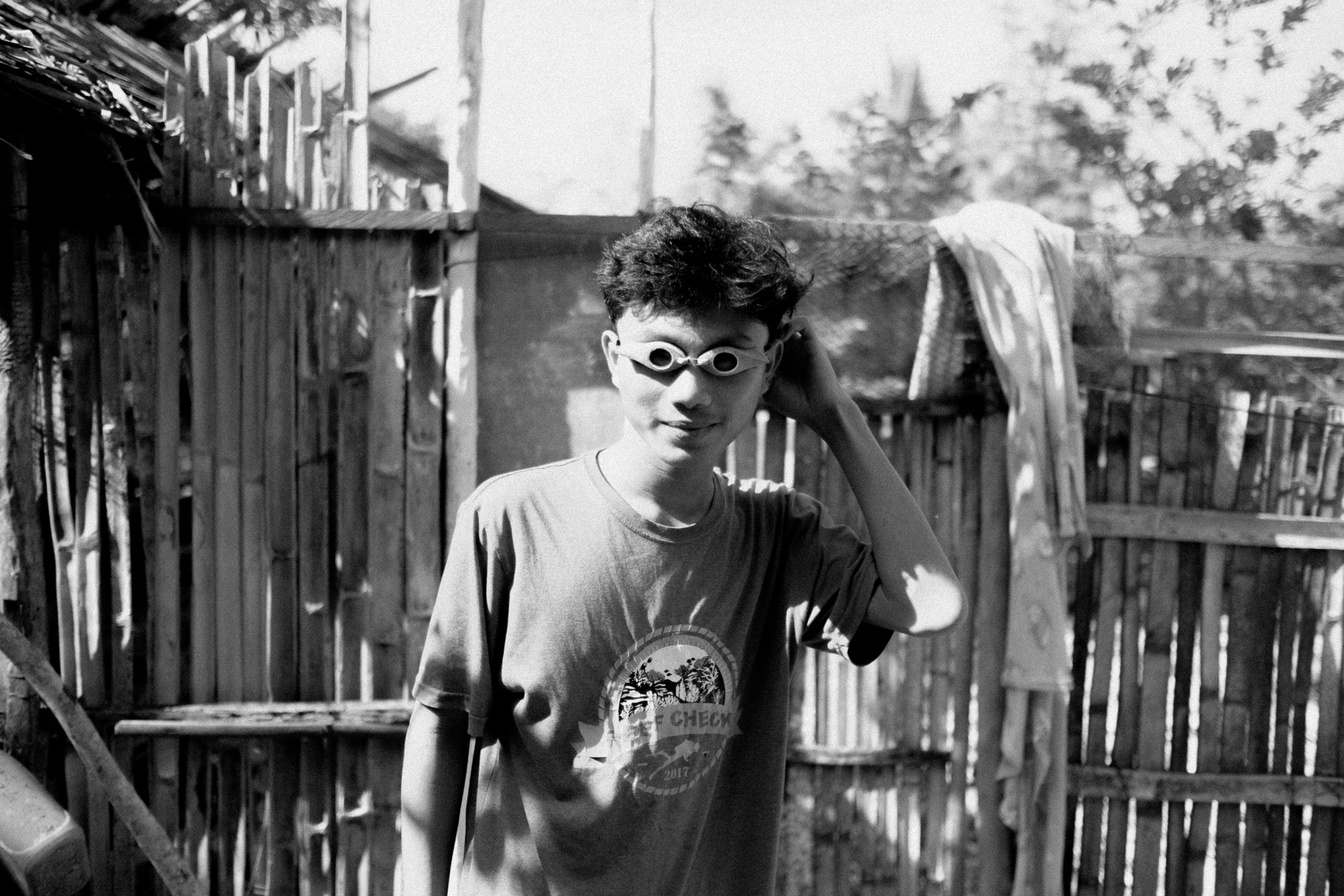 Young Boy with The Glasses