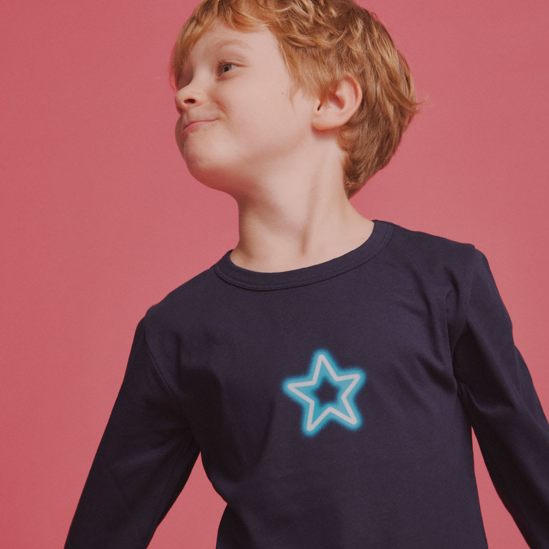 boy wearing snap cardigan