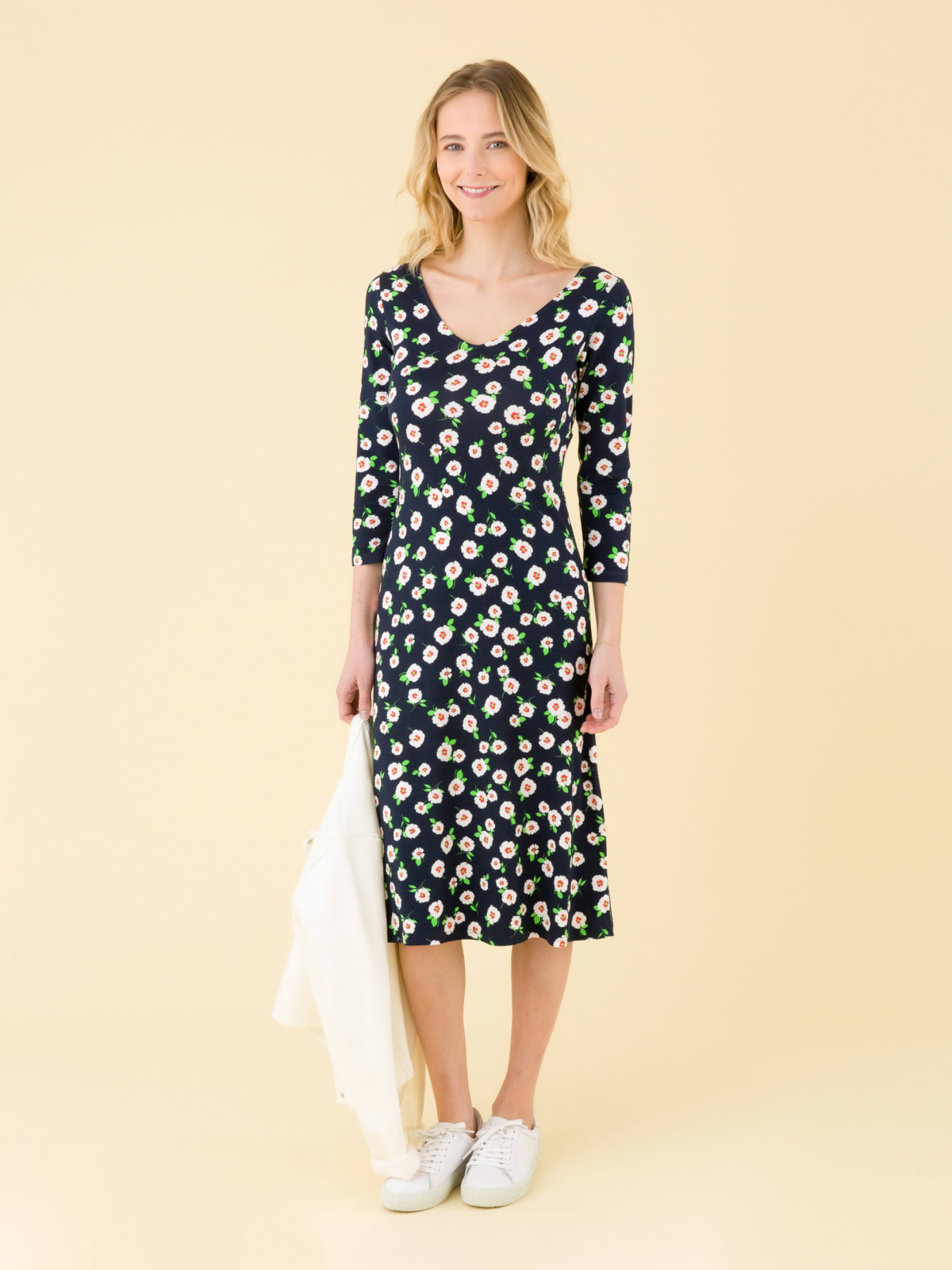 navy blue New Danseuse dress with white floral print and 3/4 length sleeves