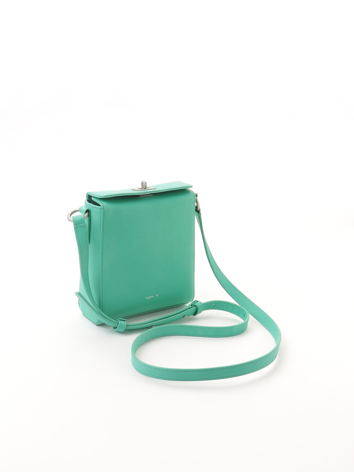light green leather shoulder bag with twist-lock fastener