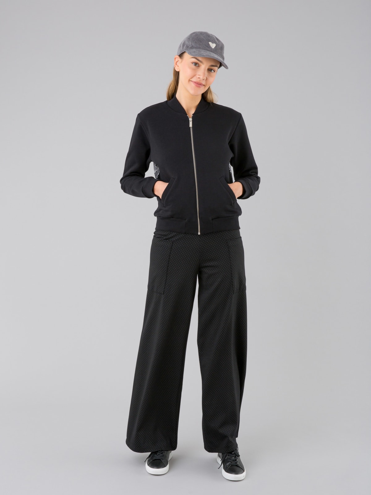 Mathis black pants with white stitching