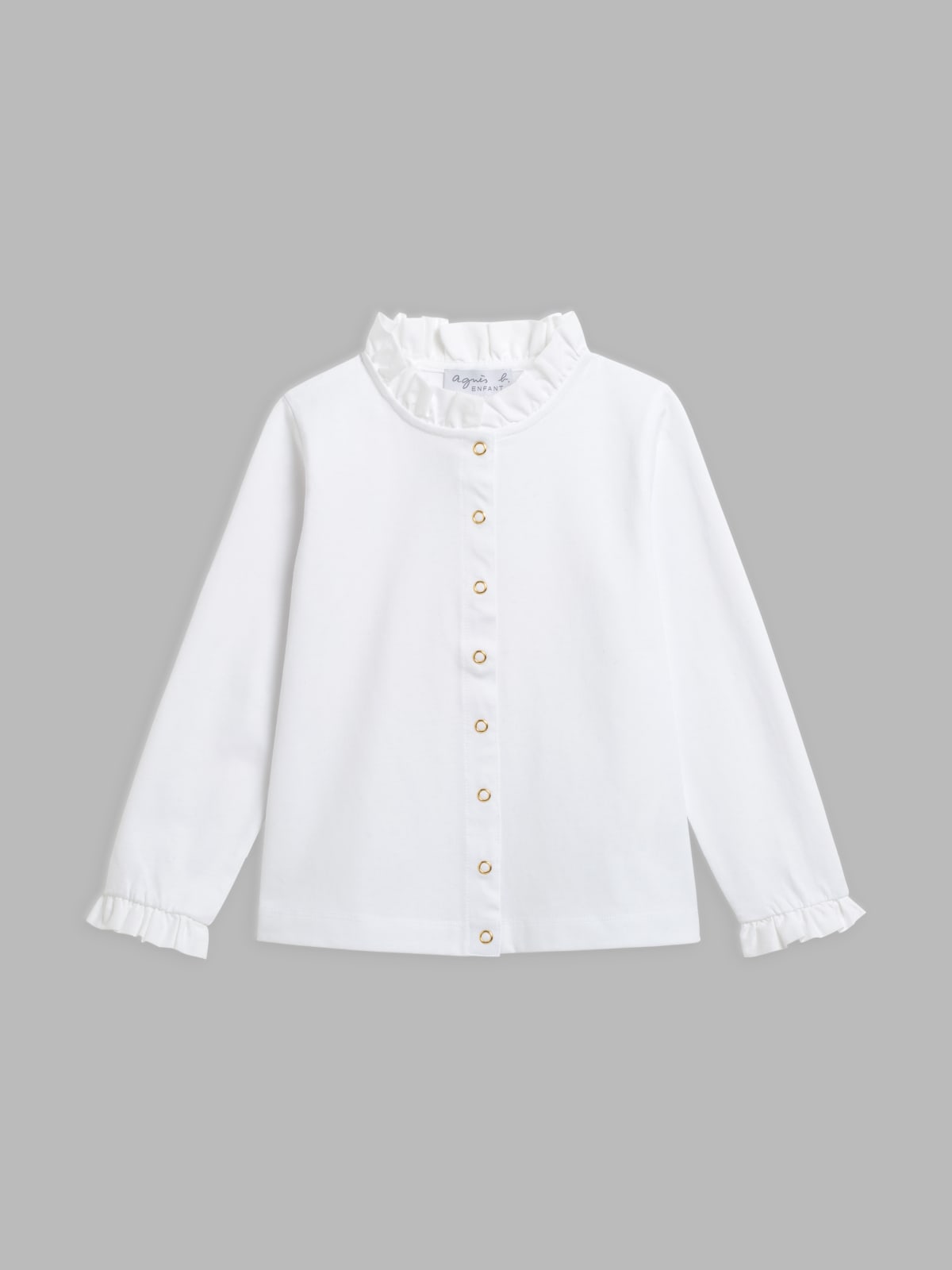 white cotton shirt with snap buttons and ruffles