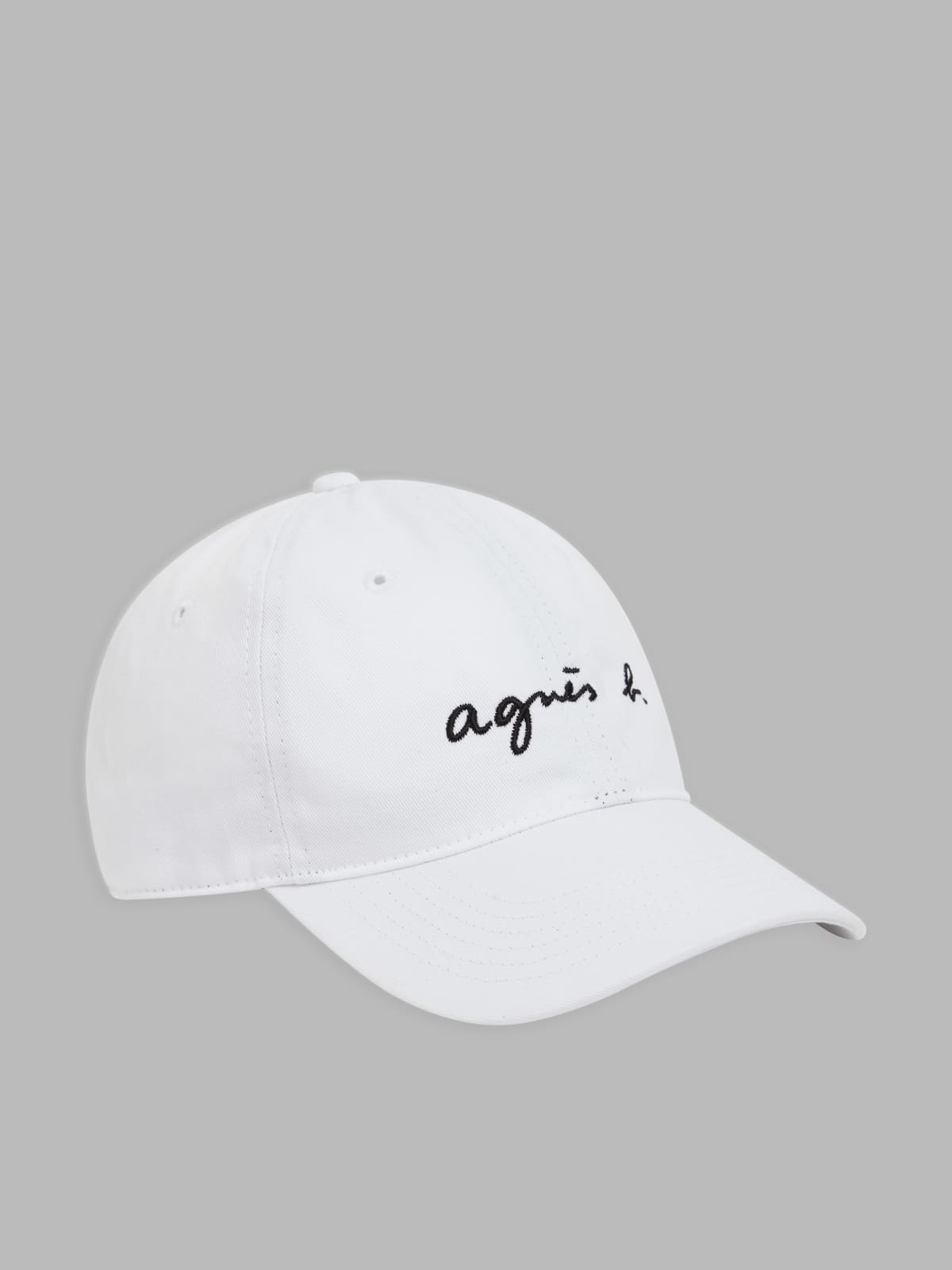 white embroidered "agnès b." cap