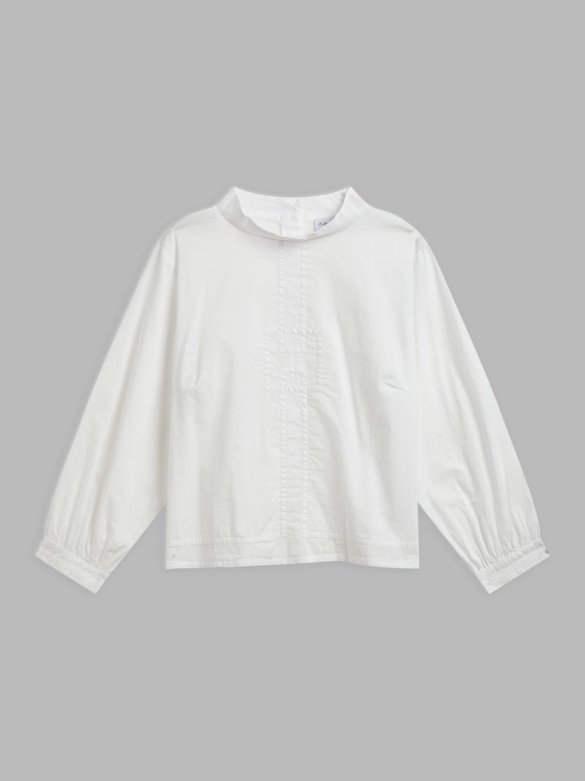 white cotton long-sleeve top