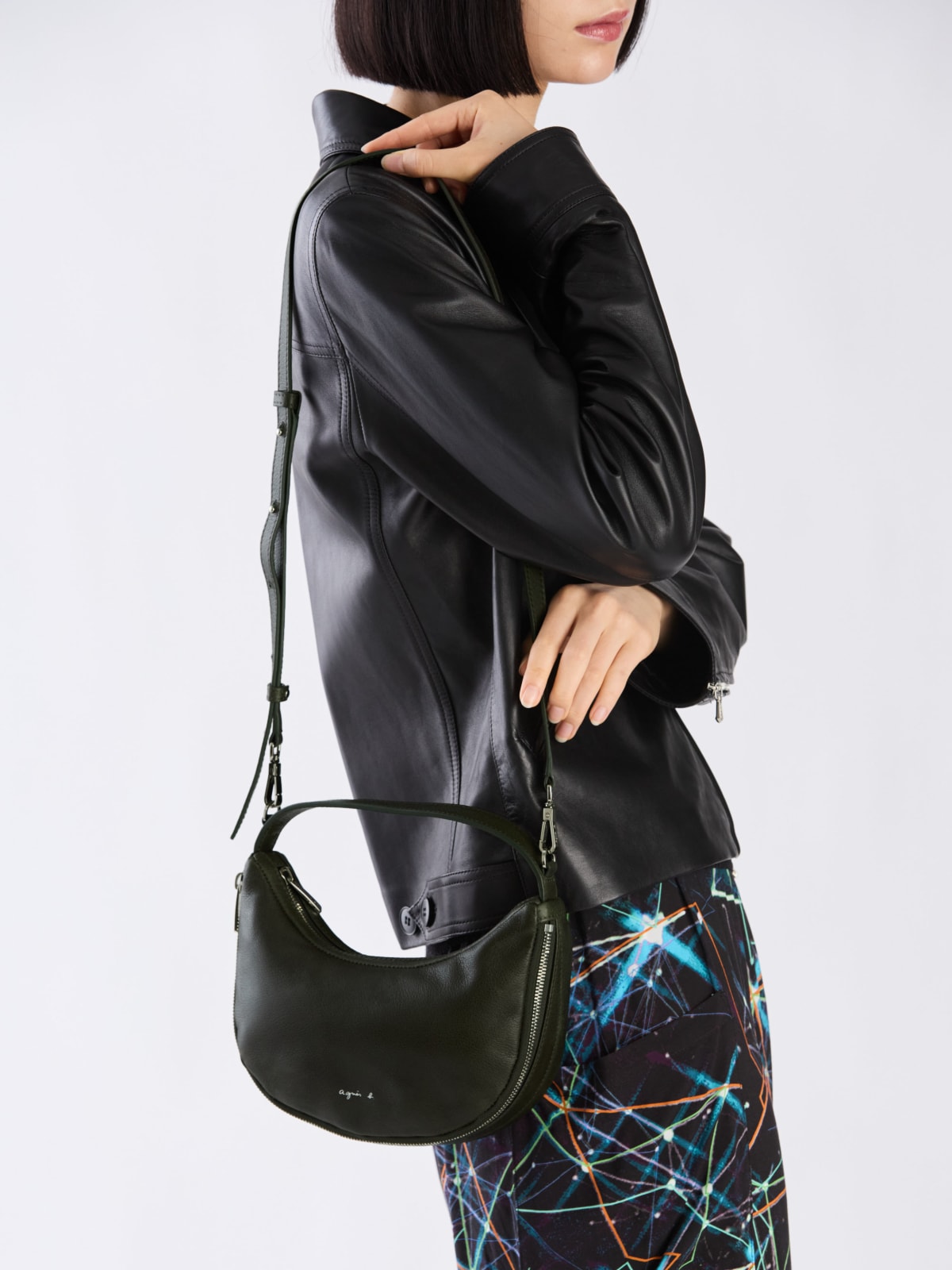 green oval leather handbag