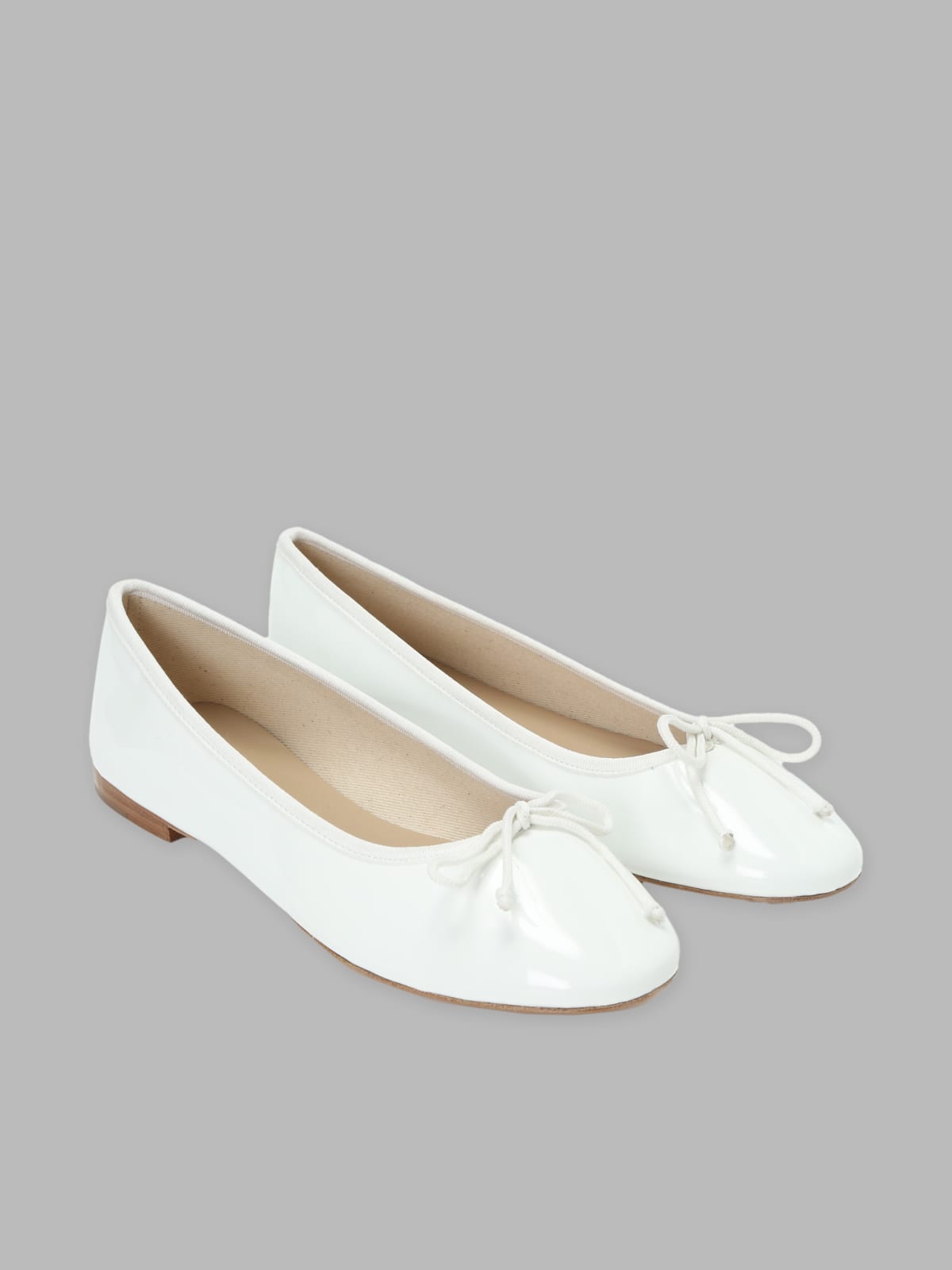 white ballerinas in leather