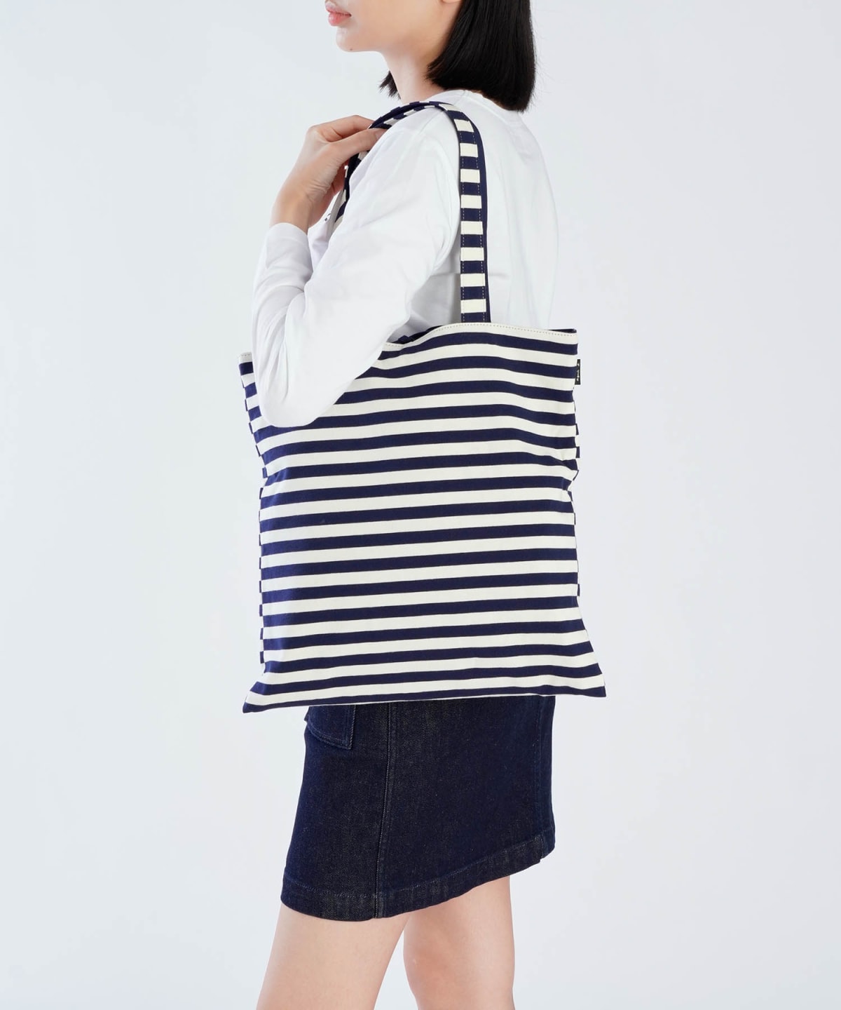 off-white and blue striped cotton bag