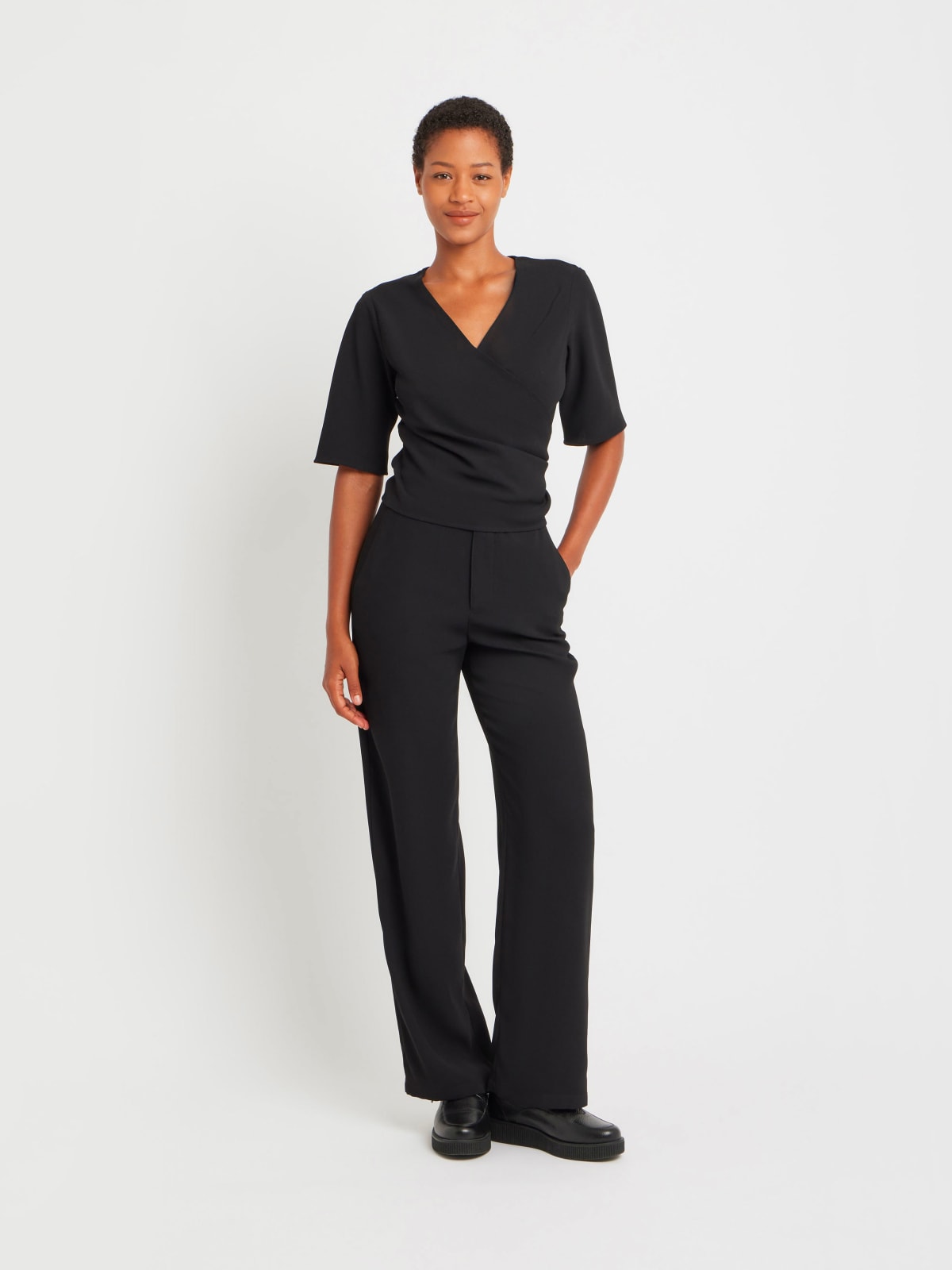black polyester wrap-over top