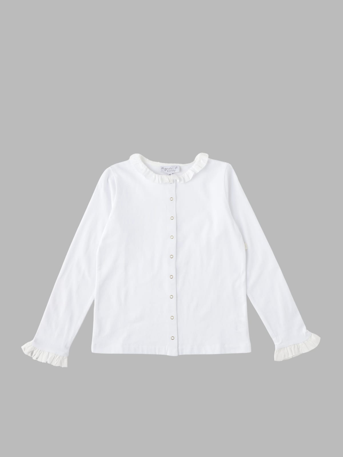 white cotton shirt with snap buttons and ruffles