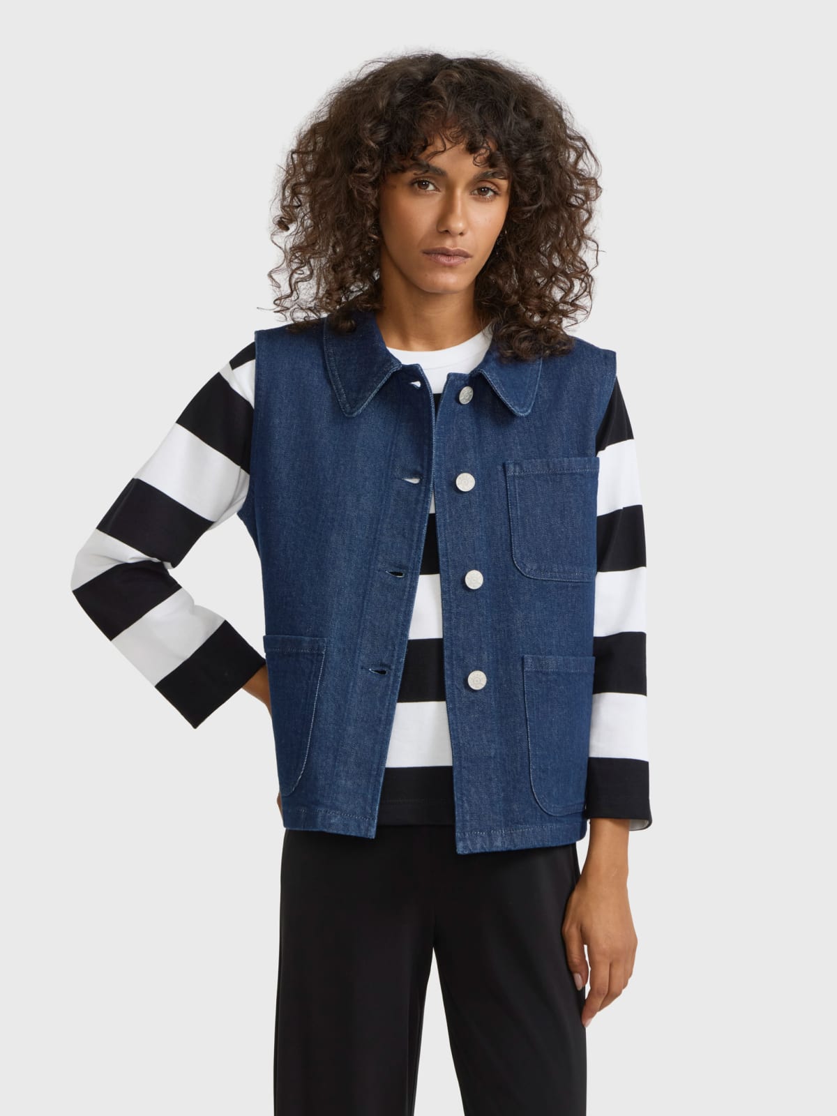 dark blue sleeveless denim jacket